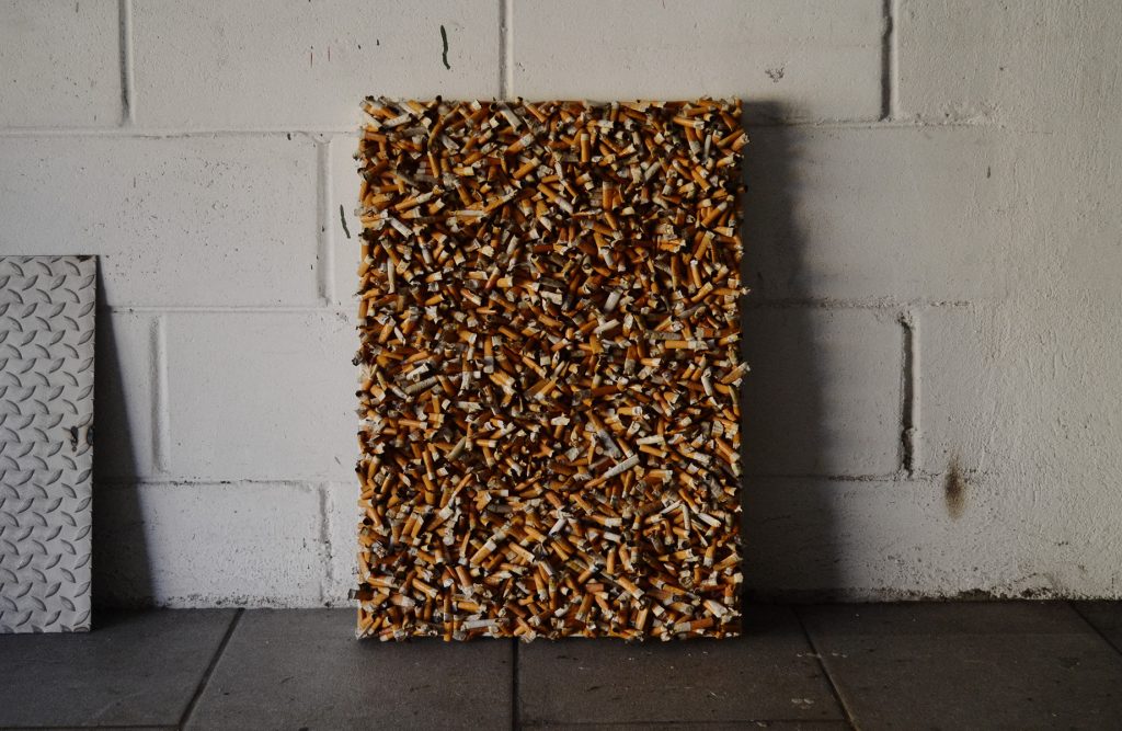 Cigarette-Butts-Collage-on-Canvas-